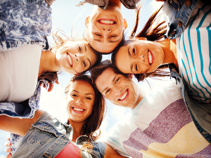 An image of home schooled teens in a circle.