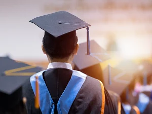 Photo of student at graduation ceremony