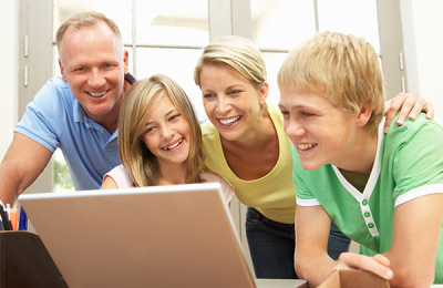 family-at-table-checking-academic-assessment