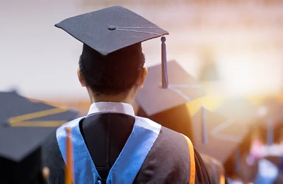 Photo of student at graduation ceremony